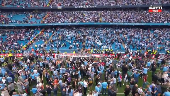 Hinchas del Manchester City invadieron el campo tras lograr el título de Premier League. (Foto: Captura ESPN)