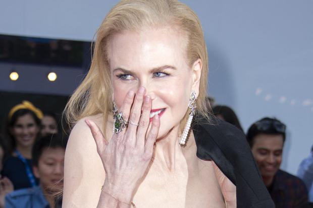 Nicole Kidman paid the bet to George Clooney, but he threw another amount and challenged her (Photo: Valerie Macon / AFP)