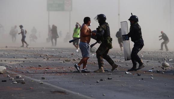 Enfrentamiento en la Panamericana Sur, Barrio Chino, en Ica. (Foto: Hugo Curotto /GEC)